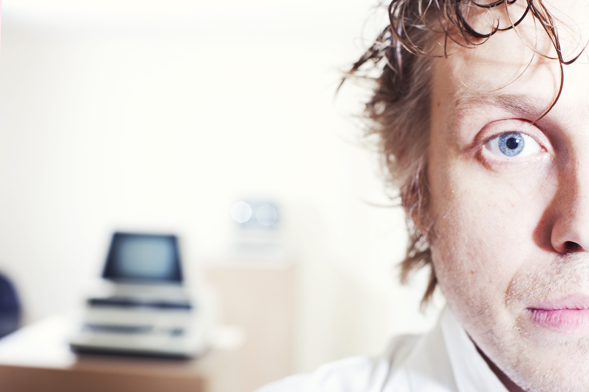 man in shirt looking stressed